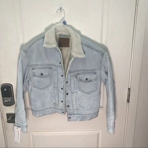 A warm jean jacket for the cooler days come. NWT the size is a small.
